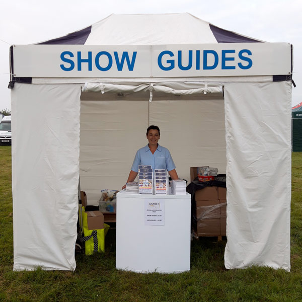 GW Publishing staff member in marquee