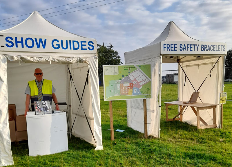 Large format maps and safety bracelets